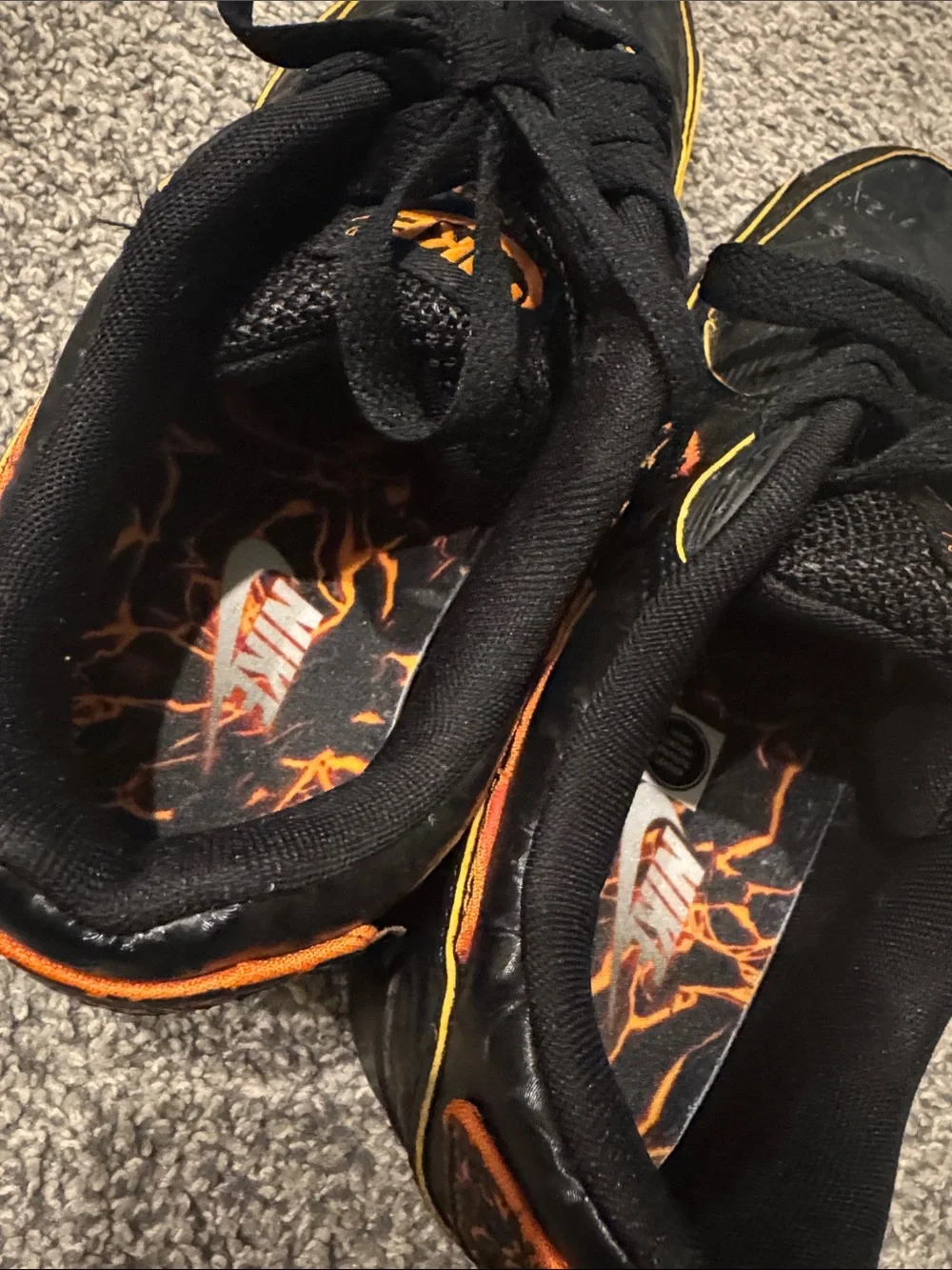 Nike Black Sneakers with Orange Accents